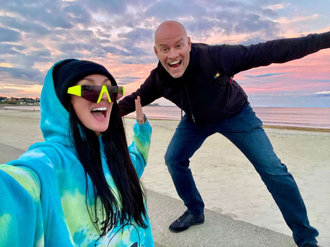 Kelly Dempsey and a MassLive reporter on a beach for the Barterloo feature